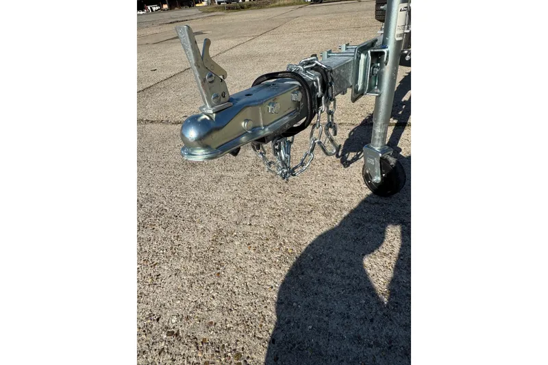 Slide: The Image of Trailer hitch of 2026 SeaArk 1960 Slayer Pro on concrete surface. - 24