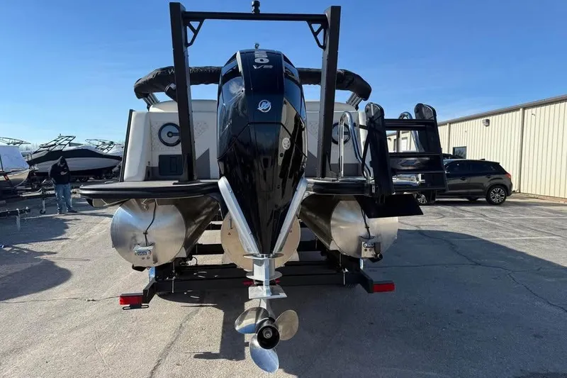 Slide: The Image of Alera mq23 boat, 2026 model, with powerful outboard motor in a marina setting. - 6