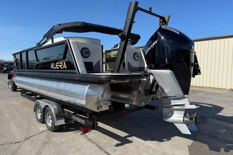 Slide: The Image of Alera MQ23 2026 pontoon boat on trailer with Mercury outboard motor. - 7