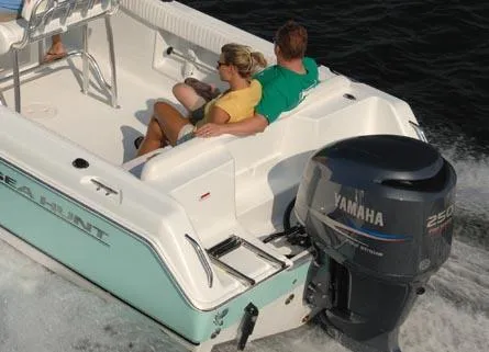 Slide: The Image of 2009 Sea Hunt Ultra 232 boat dashboard with gauges, compass, and navigation equipment. - 3