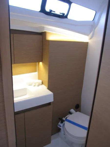 Slide: The Image of Modern bathroom in 2024 Jeanneau 380 sailboat with sleek design and ample lighting. - 17