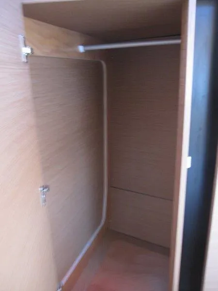 Slide: The Image of 2024 Jeanneau 380 yacht interior closet with wooden finish - 26