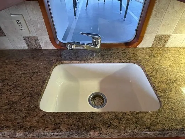 Slide: The Image of 1994 DeFever Double Cabin kitchen sink with granite countertop and modern faucet. - 19