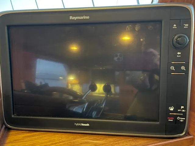 Slide: The Image of Raymarine HybridTouch display on 1994 DeFever Double Cabin yacht dashboard. - 45