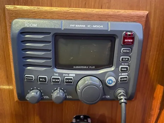 Slide: The Image of VHF marine radio IC-M504 on 1994 DeFever Double Cabin boat dashboard. - 47