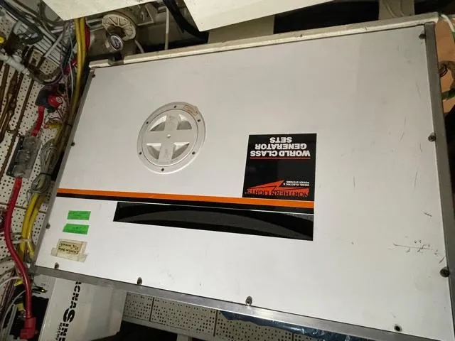 Slide: The Image of Engine room of 1994 DeFever Double Cabin with generator set. - 54