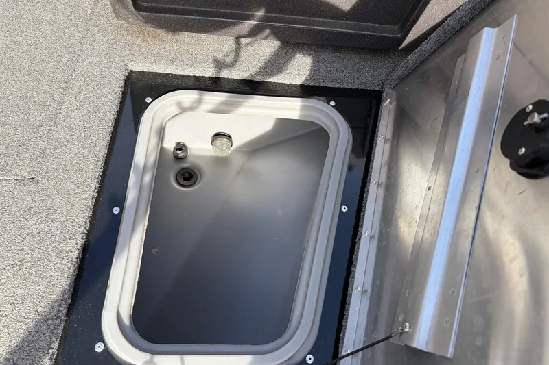 Slide: The Image of 2022 Tracker Pro Guide V-175 Combo boat livewell interior view. - 14