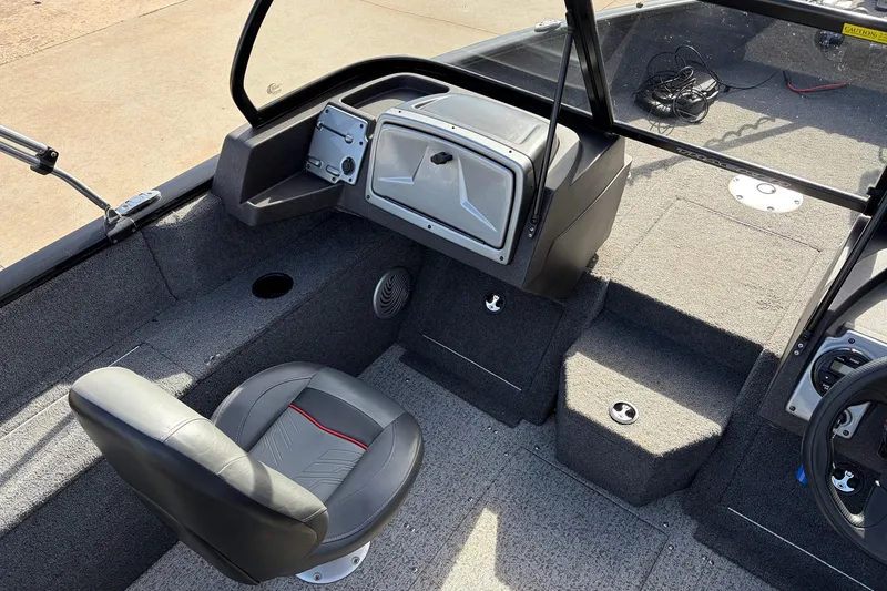 Slide: The Image of 2022 Tracker Pro Guide V-175 Combo boat interior with seating and dashboard. - 21