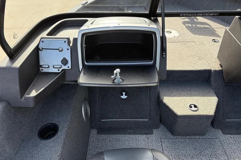 Slide: The Image of 2022 Tracker Pro Guide V-175 Combo boat interior with storage compartment and seating. - 22