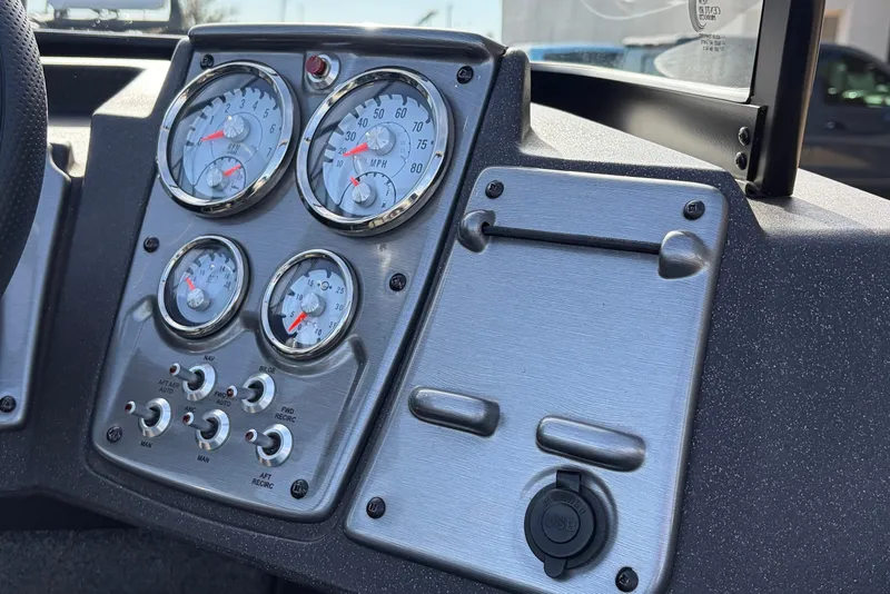Slide: The Image of Dashboard of 2022 Tracker Pro Guide V-175 Combo boat with gauges and controls. - 30