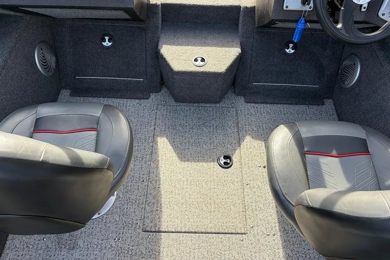 Slide: The Image of 2022 Tracker Pro Guide V-175 Combo boat interior with two seats and carpeted flooring. - 31