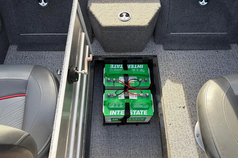 Slide: The Image of 2022 Tracker Pro Guide V-175 Combo boat battery compartment with Interstate batteries. - 32