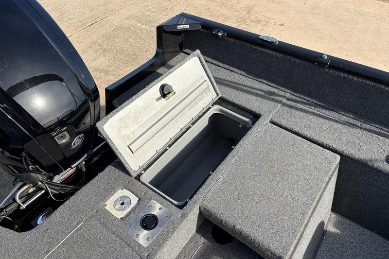 Slide: The Image of 2022 Tracker Pro Guide V-175 Combo boat interior with open storage compartment. - 37