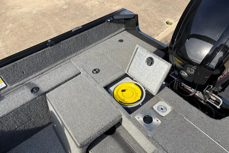 Slide: The Image of 2022 Tracker Pro Guide V-175 Combo boat interior with open storage compartment. - 39