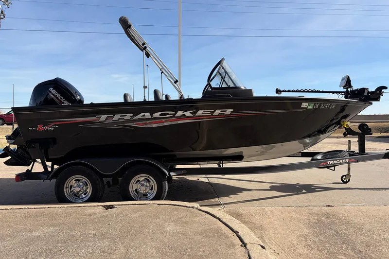 Slide: The Image of 2022 Tracker Pro Guide V-175 Combo boat on trailer, side view. - 4
