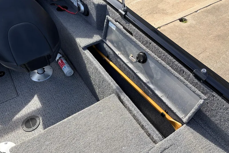 Slide: The Image of 2022 Tracker Pro Guide V-175 Combo boat interior with storage compartment and seat. - 43