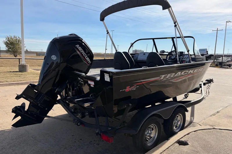 Slide: The Image of 2022 Tracker Pro Guide V-175 Combo boat with Mercury engine on trailer. - 5
