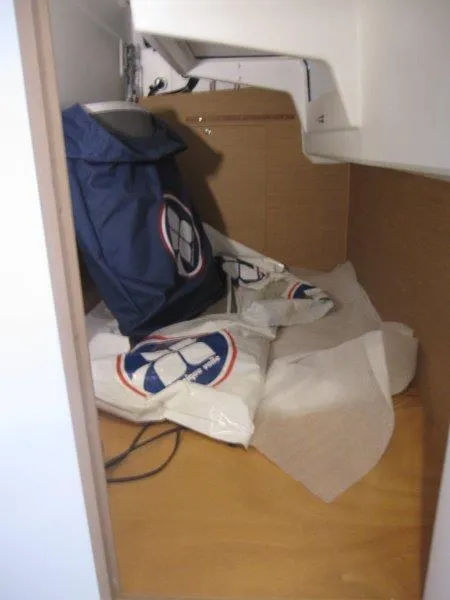 Slide: The Image of Storage compartment in 2024 Jeanneau 380 sailboat with life jackets. - 17