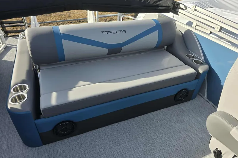 Slide: The Image of 2026 Trifecta 24ULCS3 boat seating with cup holders and modern design. - 13