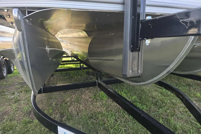 Slide: The Image of Underneath view of 2026 Trifecta 24ULCS3 pontoon boat on trailer. - 5