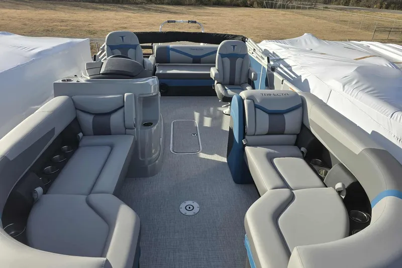 Slide: The Image of 2026 Trifecta 24ULCS3 pontoon boat interior with luxurious seating and modern design. - 6