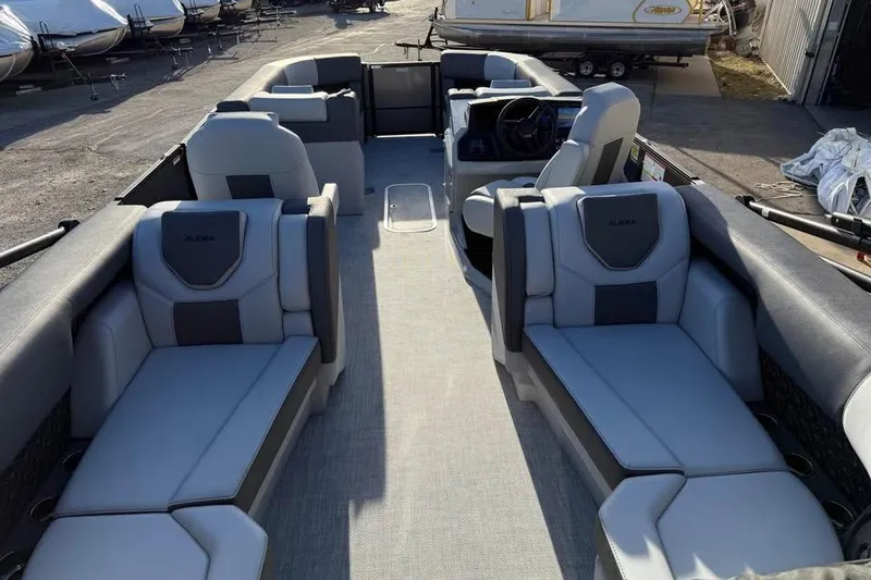 Slide: The Image of 2026 Alera M 25Q boat interior with luxurious seating and modern design. - 10