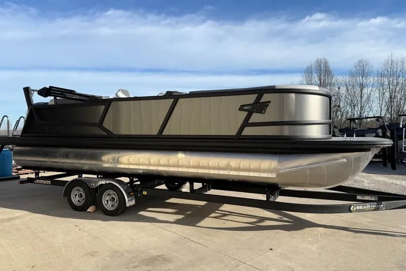 Slide: The Image of 2026 Alera M 25Q pontoon boat on trailer under clear sky. - 4