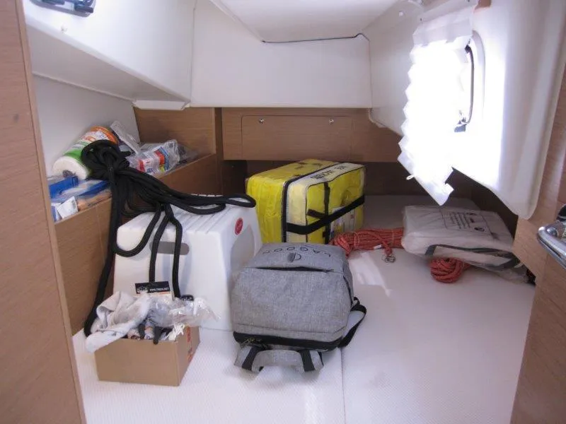 Slide: The Image of Interior storage space of 2025 Jeanneau Sun Odyssey 350 yacht with various equipment. - 36