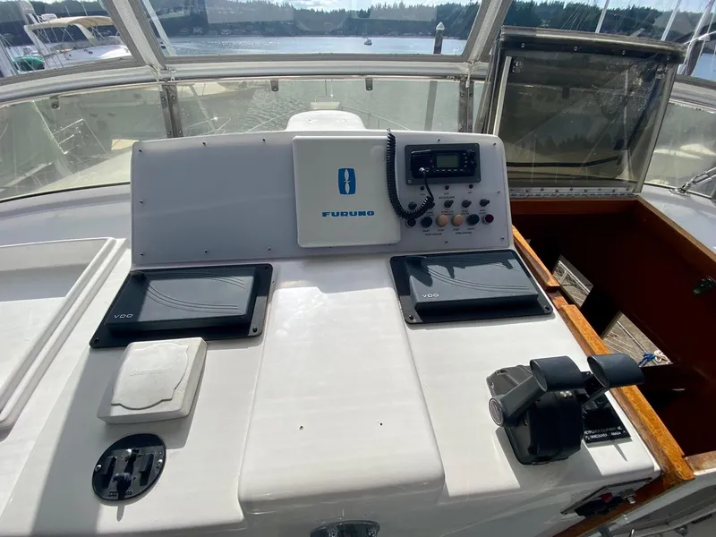 Slide: The Image of 1999 Ocean Alexander 510 Pilothouse helm station. - 24