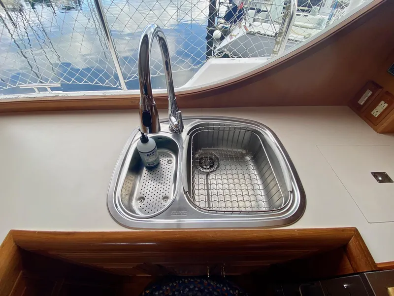 Slide: The Image of Kitchen sink on 1999 Ocean Alexander 510 Pilothouse yacht. - 47