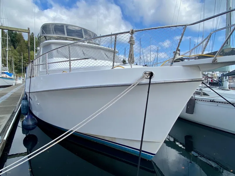 Slide: The Image of 1999 Ocean Alexander 510 Pilothouse docked at marina. - 5