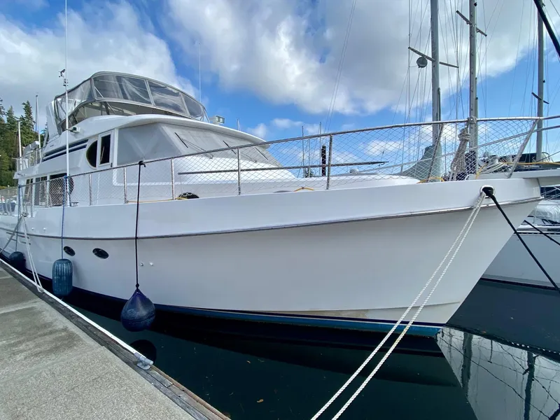 Slide: The Image of 1999 Ocean Alexander 510 Pilothouse yacht docked at marina. - 6