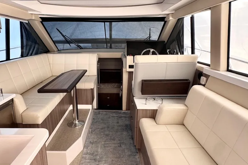 Slide: The Image of Luxurious interior of 2022 Regal 38 XO yacht with elegant seating and modern design. - 11