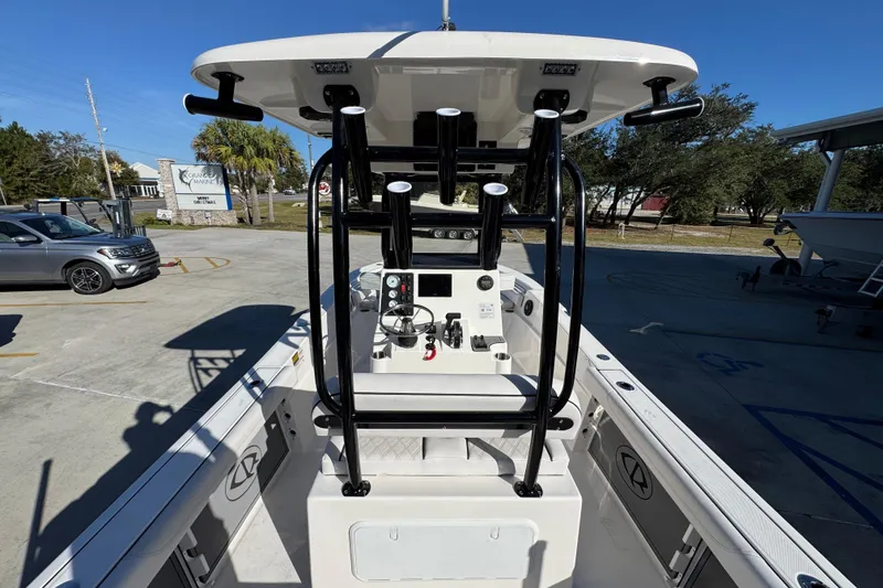 Slide: The Image of 2026 Sea Born LX231 Center Console boat with T-top and control panel. - 34