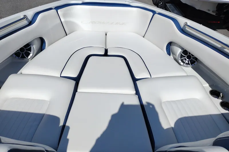 Slide: The Image of Luxurious seating area on 2026 Crownline 260 XSS boat with white upholstery. - 14