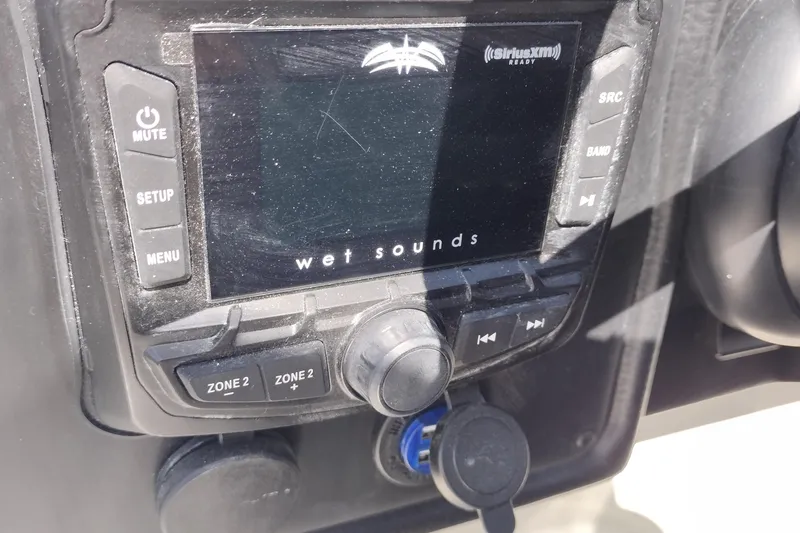 Slide: The Image of 2026 Crownline 260 XSS boat stereo system with Wet Sounds display and controls. - 26
