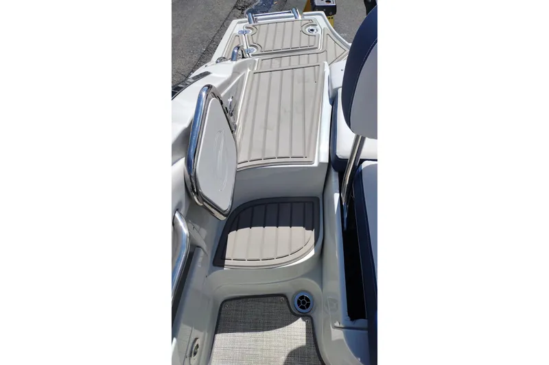 Slide: The Image of 2026 Crownline 260 XSS boat deck with sleek seating and modern design. - 38