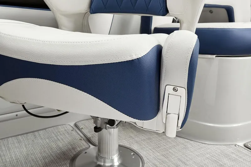 Slide: The Image of 2026 Crownline 260 XSS boat seat, featuring blue and white upholstery with modern design. - 5