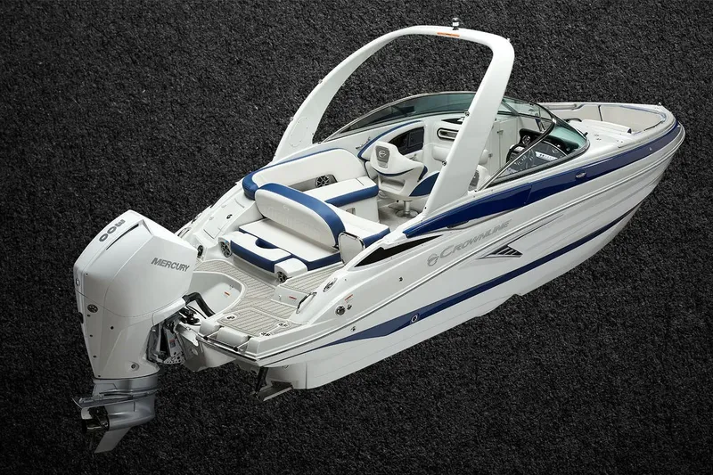 Slide: The Image of 2026 Crownline 260 XSS boat with Mercury engine, sleek design on textured background. - 6