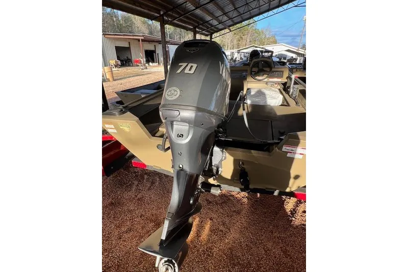 Slide: The Image of 2026 G3 Gator Tough 17 SC boat with a 70 HP outboard motor. - 2