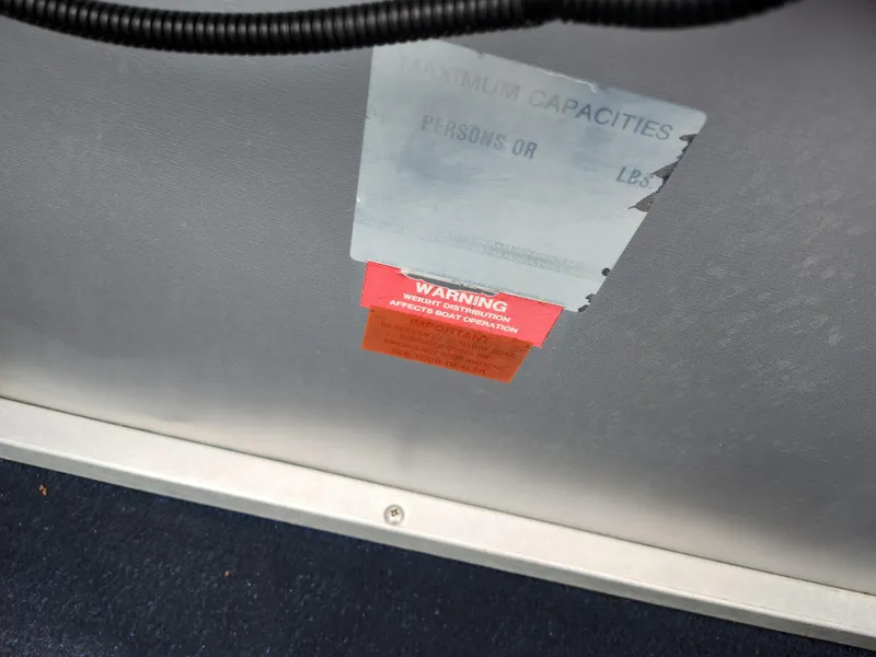 Slide: The Image of Warning label on 1991 Grumman Fish N Fun boat interior. - 17