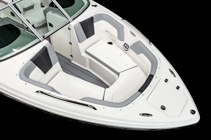 Slide: The Image of Manufacturer Provided Image: 2025 Chaparral 23 SSi OB boat interior with white and gray seating, sleek design. - 10