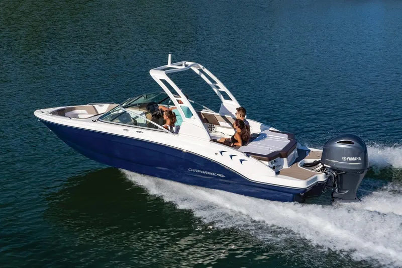Slide: The Image of Manufacturer Provided Image: 2025 Chaparral 23 SSi OB boat cruising on a lake with passengers enjoying the ride. - 9