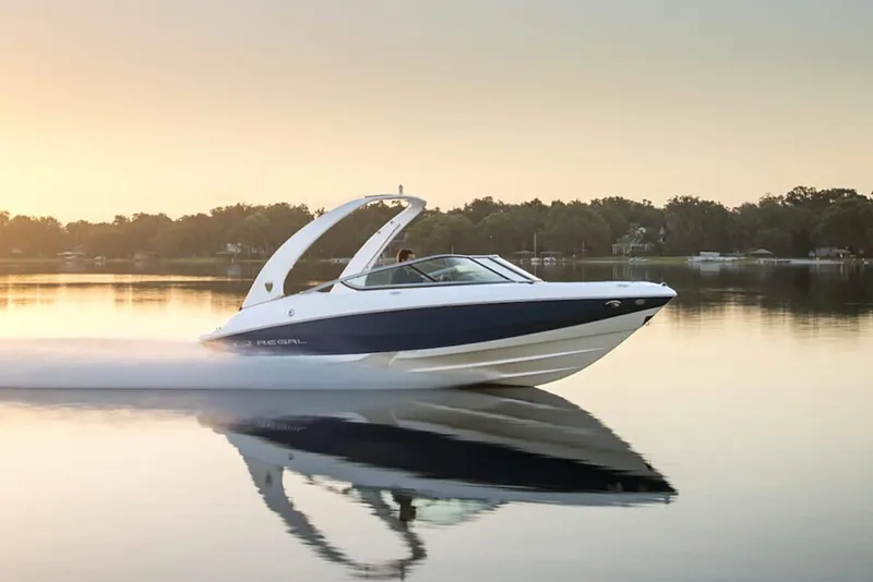 The Image of Manufacturer Provided Image: 2026 Regal 2000 ES boat cruising on calm water at sunset. - 0