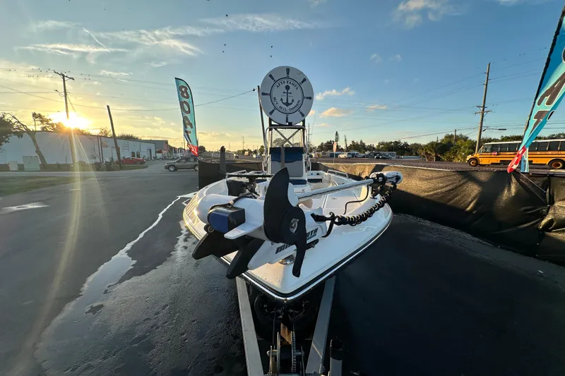 Slide: The Image of 2014 Skeeter SX2250 boat on trailer under cloudy sky. - 10