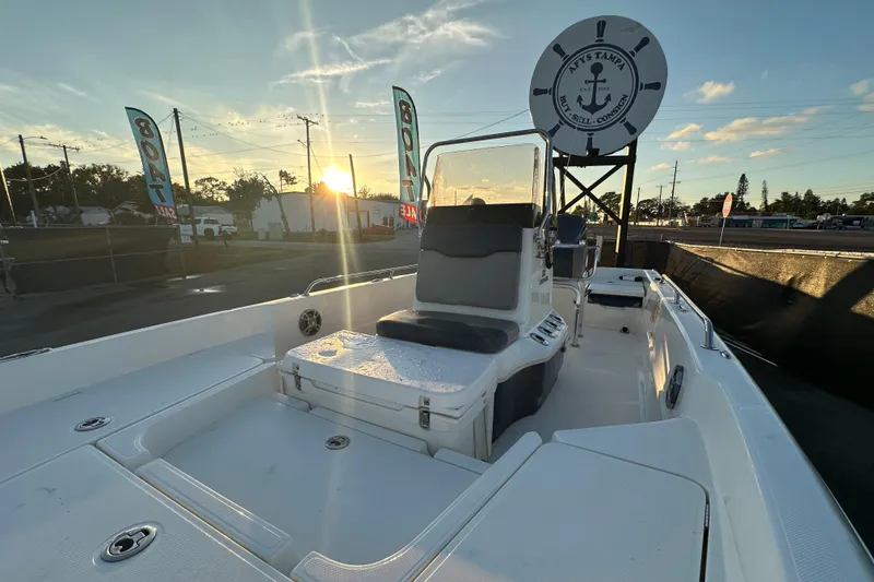 Slide: The Image of 2014 Skeeter SX2250 boat interior with steering console and seating. - 17