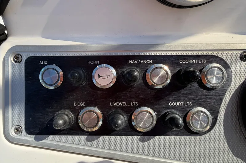 Slide: The Image of Yamaha gauges on a 2014 Skeeter SX2250 boat dashboard, showing speed and fuel indicators. - 23