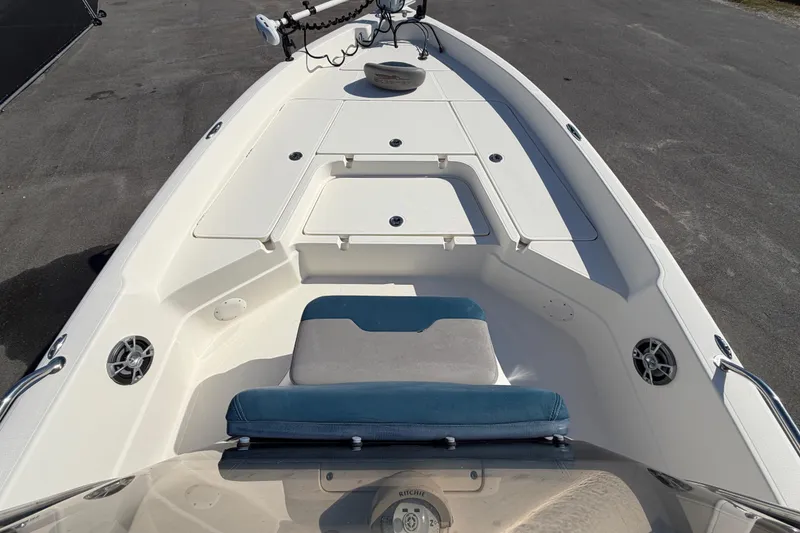 Slide: The Image of 2014 Skeeter SX2250 boat deck with seating and storage compartments. - 31