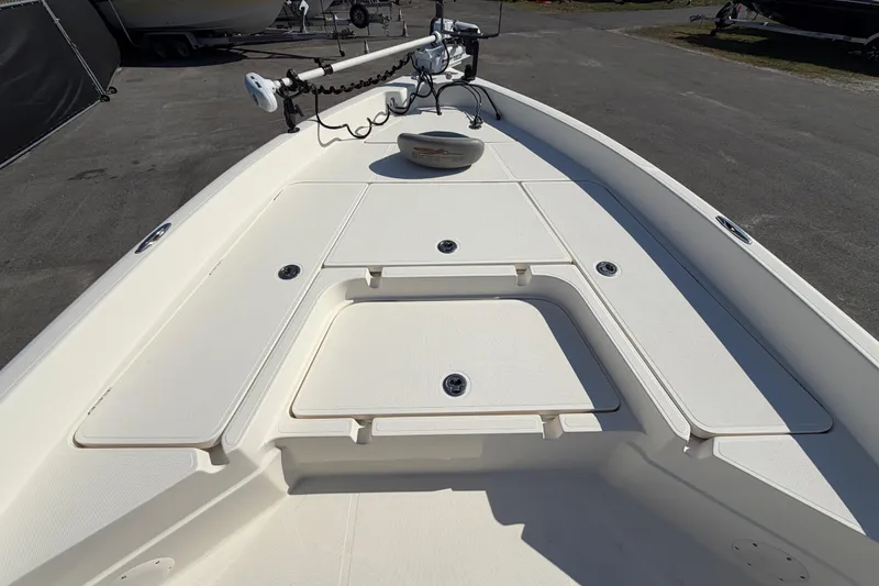 Slide: The Image of 2014 Skeeter SX2250 boat deck with storage compartment and latch. - 33
