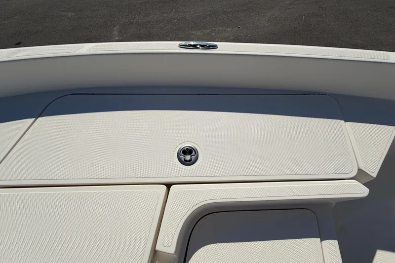 Slide: The Image of Open storage compartment on a 2014 Skeeter SX2250 boat deck. - 40